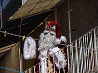 Miguel Moctezuma is characterized as Santa Claus Illuminated during his visit to some of the iconic places in the Tepito neighborhood as par...