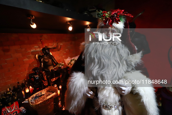 Miguel Moctezuma is characterized as Santa Claus Illuminated during his visit to some of the iconic places in the Tepito neighborhood as par...