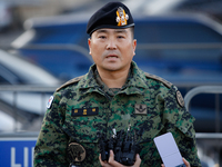 Colonel Kim Hyun-tae, Commander of the 707th Special Mission Group, holds a press conference in front of the Defense Convention Center in Yo...