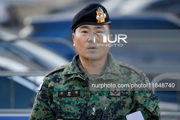 Colonel Kim Hyun-tae, Commander of the 707th Special Mission Group, holds a press conference in front of the Defense Convention Center in Yo...