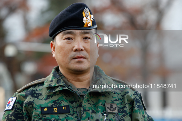 Colonel Kim Hyun-tae, Commander of the 707th Special Mission Group, holds a press conference in front of the Defense Convention Center in Yo...