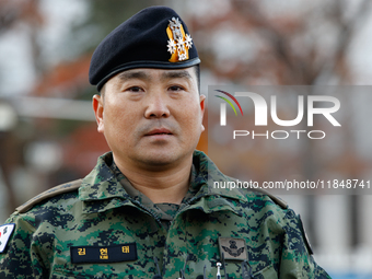 Colonel Kim Hyun-tae, Commander of the 707th Special Mission Group, holds a press conference in front of the Defense Convention Center in Yo...