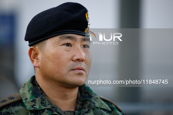 Colonel Kim Hyun-tae, Commander of the 707th Special Mission Group, holds a press conference in front of the Defense Convention Center in Yo...