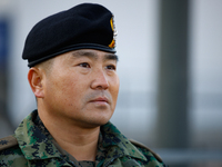 Colonel Kim Hyun-tae, Commander of the 707th Special Mission Group, holds a press conference in front of the Defense Convention Center in Yo...