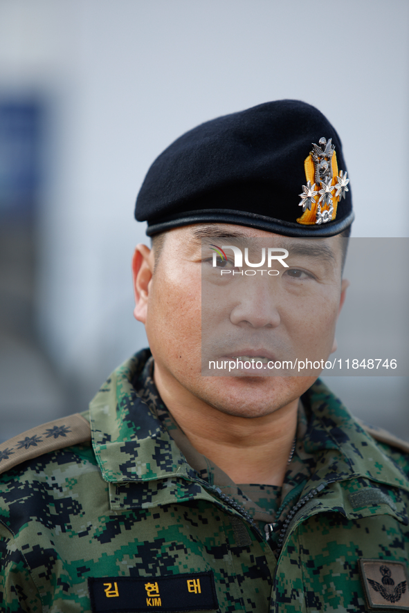 Colonel Kim Hyun-tae, Commander of the 707th Special Mission Group, holds a press conference in front of the Defense Convention Center in Yo...