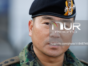 Colonel Kim Hyun-tae, Commander of the 707th Special Mission Group, holds a press conference in front of the Defense Convention Center in Yo...