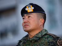 Colonel Kim Hyun-tae, Commander of the 707th Special Mission Group, sheds tears during a press conference in front of the Defense Convention...