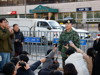 Colonel Kim Hyun-tae, Commander of the 707th Special Mission Group, holds a press conference in front of the Defense Convention Center in Yo...