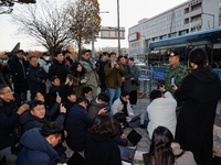 Colonel Kim Hyun-tae, Commander of the 707th Special Mission Group, holds a press conference in front of the Defense Convention Center in Yo...