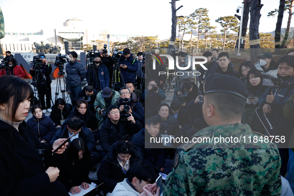 Colonel Kim Hyun-tae, Commander of the 707th Special Mission Group, holds a press conference in front of the Defense Convention Center in Yo...