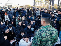 Colonel Kim Hyun-tae, Commander of the 707th Special Mission Group, holds a press conference in front of the Defense Convention Center in Yo...