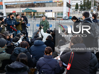 Colonel Kim Hyun-tae, Commander of the 707th Special Mission Group, holds a press conference in front of the Defense Convention Center in Yo...