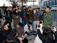 Colonel Kim Hyun-tae, Commander of the 707th Special Mission Group, holds a press conference in front of the Defense Convention Center in Yo...