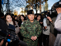 Colonel Kim Hyun-tae, Commander of the 707th Special Mission Group, holds a press conference in front of the Defense Convention Center in Yo...