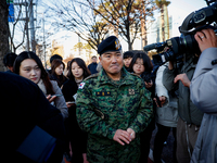 Colonel Kim Hyun-tae, Commander of the 707th Special Mission Group, holds a press conference in front of the Defense Convention Center in Yo...