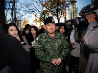 Colonel Kim Hyun-tae, Commander of the 707th Special Mission Group, holds a press conference in front of the Defense Convention Center in Yo...