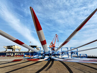 A large number of wind power generation equipment is ready to be shipped for export at the terminal of Oriental Port Branch of Lianyungang P...