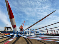 A large number of wind power generation equipment is ready to be shipped for export at the terminal of Oriental Port Branch of Lianyungang P...