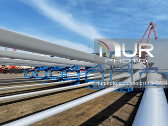 A large number of wind power generation equipment is ready to be shipped for export at the terminal of Oriental Port Branch of Lianyungang P...