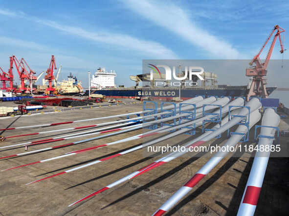 A large number of wind power generation equipment is ready to be shipped for export at the terminal of Oriental Port Branch of Lianyungang P...