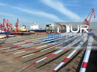 A large number of wind power generation equipment is ready to be shipped for export at the terminal of Oriental Port Branch of Lianyungang P...