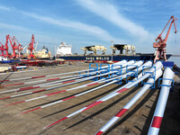 A large number of wind power generation equipment is ready to be shipped for export at the terminal of Oriental Port Branch of Lianyungang P...