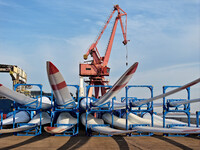 A large number of wind power generation equipment is ready to be shipped for export at the terminal of Oriental Port Branch of Lianyungang P...