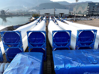 A large number of wind power generation equipment is ready to be shipped for export at the terminal of Oriental Port Branch of Lianyungang P...