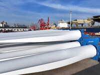 A large number of wind power generation equipment is ready to be shipped for export at the terminal of Oriental Port Branch of Lianyungang P...