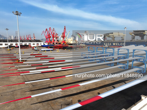 A large number of wind power generation equipment is ready to be shipped for export at the terminal of Oriental Port Branch of Lianyungang P...