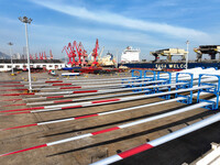 A large number of wind power generation equipment is ready to be shipped for export at the terminal of Oriental Port Branch of Lianyungang P...