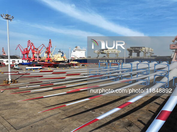 A large number of wind power generation equipment is ready to be shipped for export at the terminal of Oriental Port Branch of Lianyungang P...