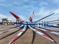 A large number of wind power generation equipment is ready to be shipped for export at the terminal of Oriental Port Branch of Lianyungang P...