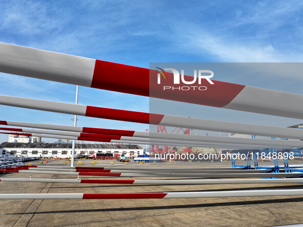 A large number of wind power generation equipment is ready to be shipped for export at the terminal of Oriental Port Branch of Lianyungang P...