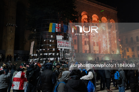 Anti-government protesters rally outside the parliament for an eleventh consecutive day of mass demonstrations against the government's post...