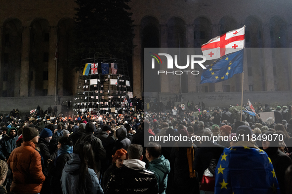 Anti-government protesters rally outside the parliament for an eleventh consecutive day of mass demonstrations against the government's post...