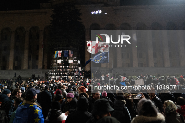 Anti-government protesters rally outside the parliament for an eleventh consecutive day of mass demonstrations against the government's post...