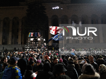 Anti-government protesters rally outside the parliament for an eleventh consecutive day of mass demonstrations against the government's post...