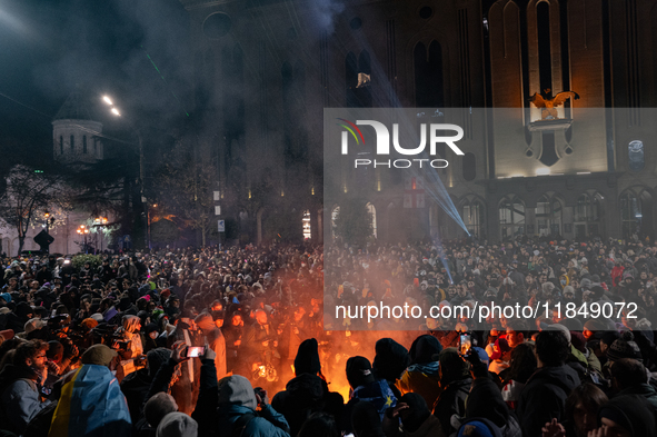 Anti-government protesters rally outside the parliament for an eleventh consecutive day of mass demonstrations against the government's post...