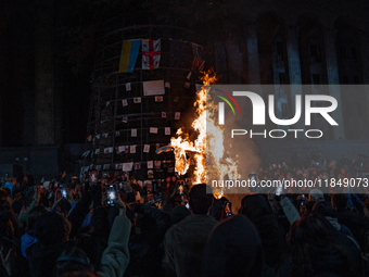 Anti-government protesters rally outside the parliament for an eleventh consecutive day of mass demonstrations against the government's post...