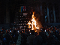 Anti-government protesters rally outside the parliament for an eleventh consecutive day of mass demonstrations against the government's post...