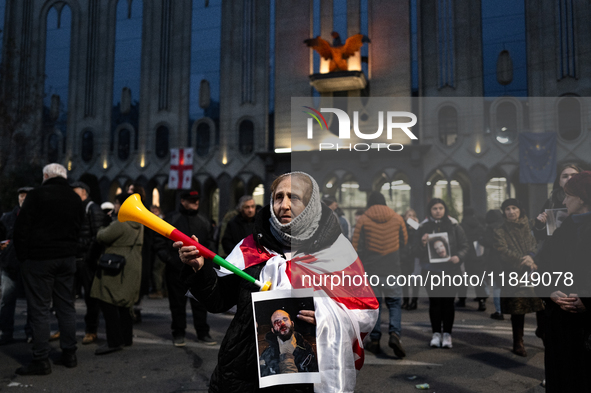 Anti-government protesters rally outside the parliament for an eleventh consecutive day of mass demonstrations against the government's post...