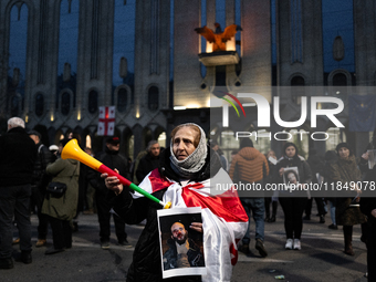 Anti-government protesters rally outside the parliament for an eleventh consecutive day of mass demonstrations against the government's post...