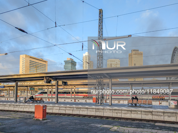 An ICE (Intercity-Express) train stands on the platform at Frankfurt am Main Central Station in Hesse, Germany, on January 1, 2024, at 9:00...