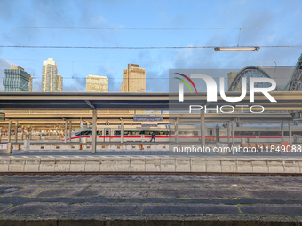 An ICE (Intercity-Express) train stands on the platform at Frankfurt am Main Central Station in Hesse, Germany, on January 1, 2024, at 9:00...