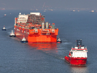 The NGUYA FLNG ship, China's first large floating natural gas liquefaction plant, sails on the Taicang section of the Yangtze River in Suzho...