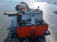 The NGUYA FLNG ship, China's first large floating natural gas liquefaction plant, sails on the Taicang section of the Yangtze River in Suzho...