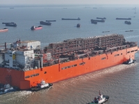 The NGUYA FLNG ship, China's first large floating natural gas liquefaction plant, sails on the Taicang section of the Yangtze River in Suzho...