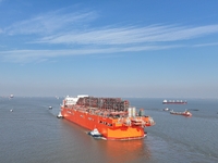 The NGUYA FLNG ship, China's first large floating natural gas liquefaction plant, sails on the Taicang section of the Yangtze River in Suzho...