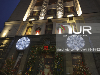 Christmas decorations and lights adorn the streets of Kharkiv, Ukraine, on December 7, 2024. (